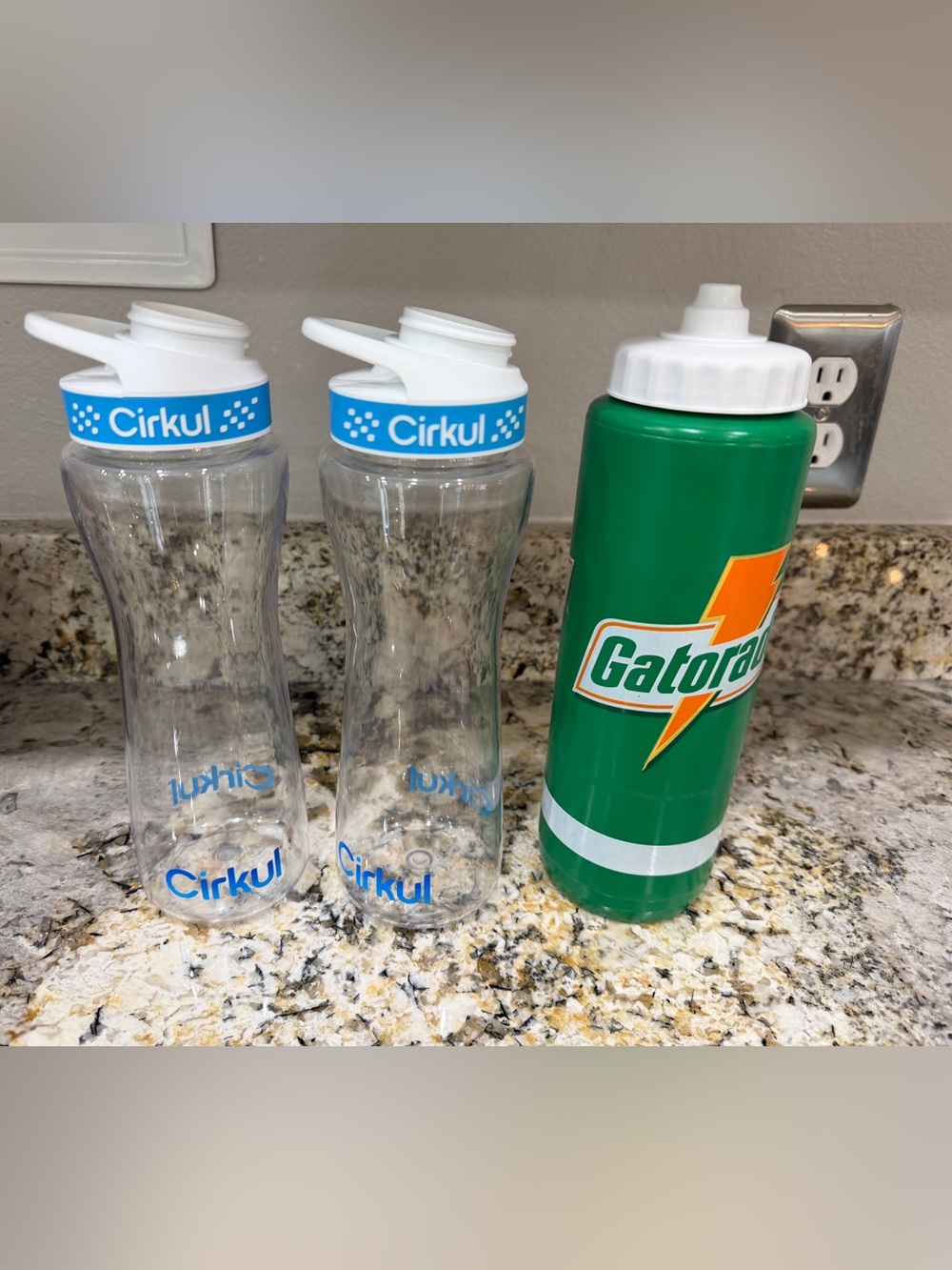 2 Cirkul Bottles and 1 Gatorade Bottle